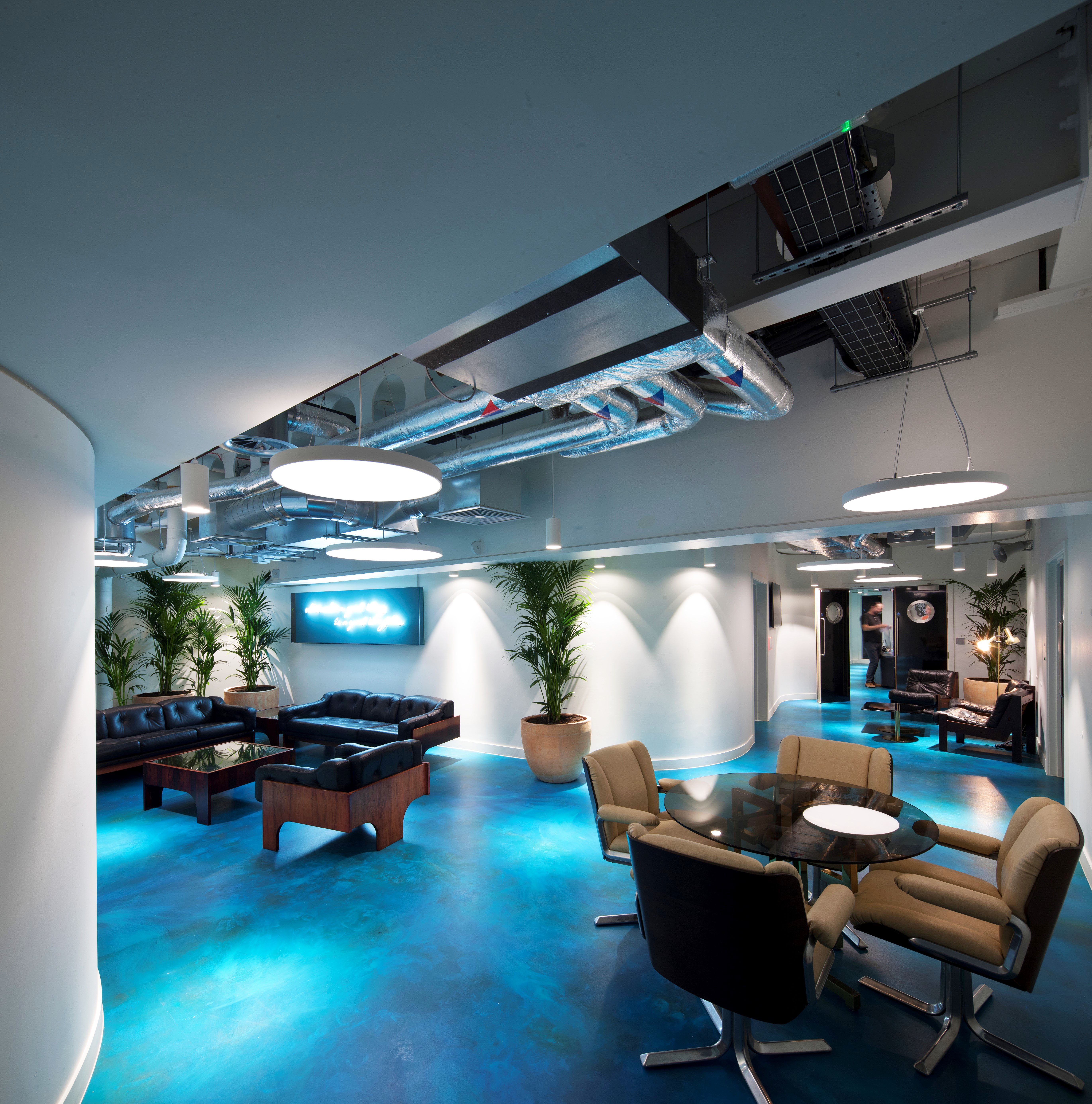 A blue resin floor in an office