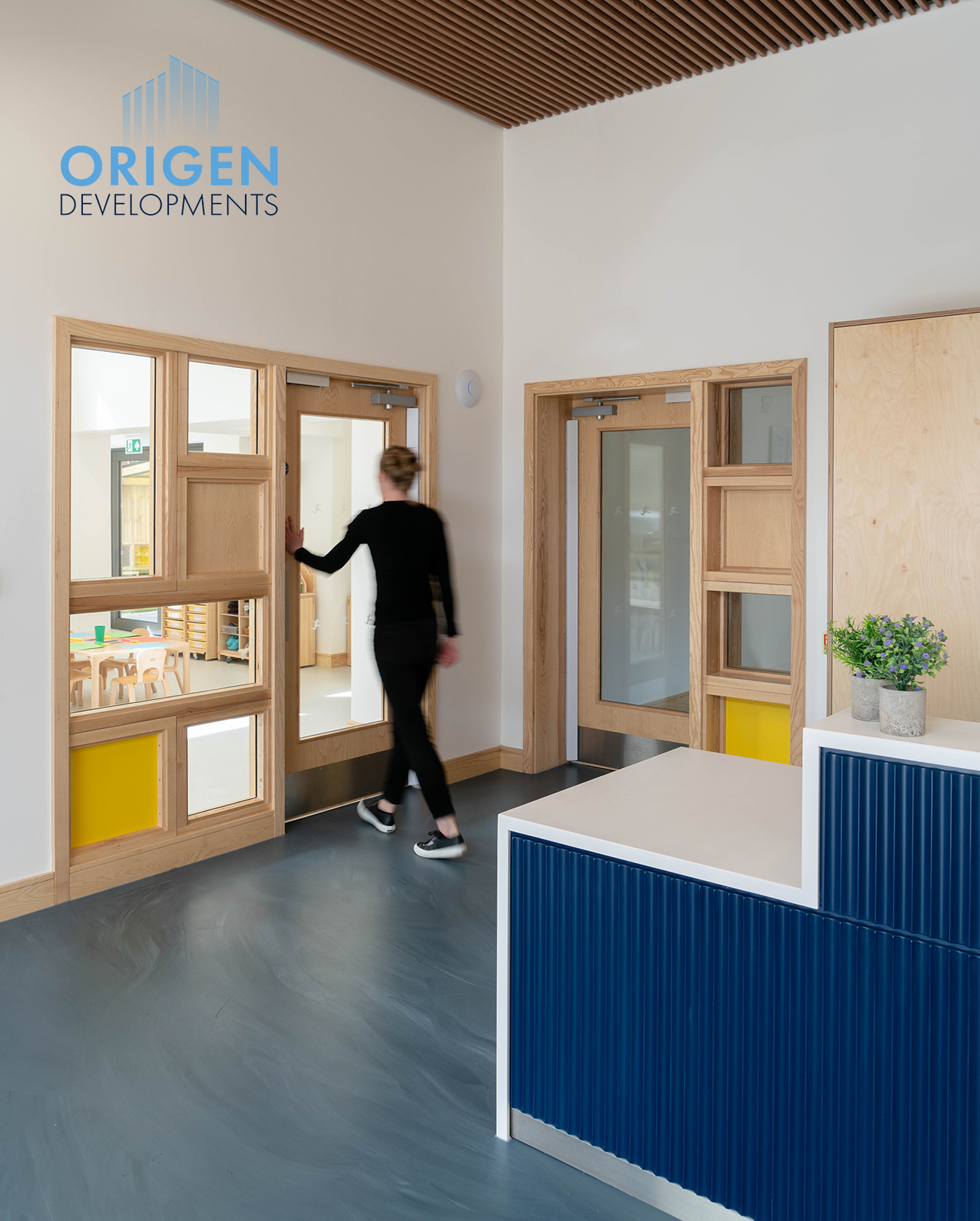 Blue resin nursery flooring in a hallway
