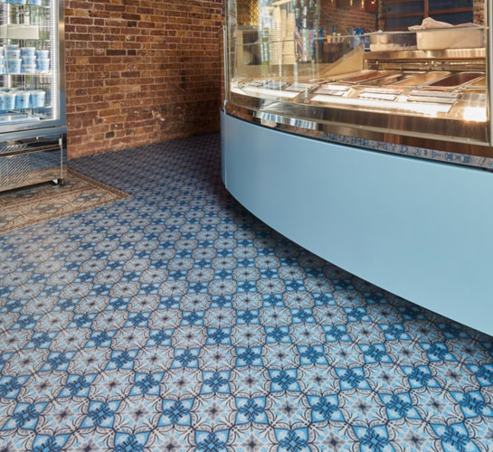 Blue patterned commercial resin flooring in an ice cream store
