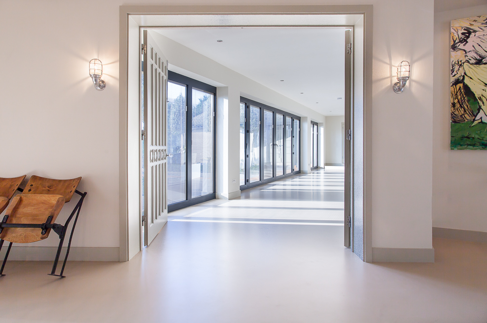 Resin Autumnal flooring in a warm grey