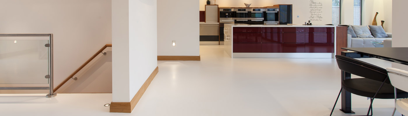 Open plan kitchen with resin flooring