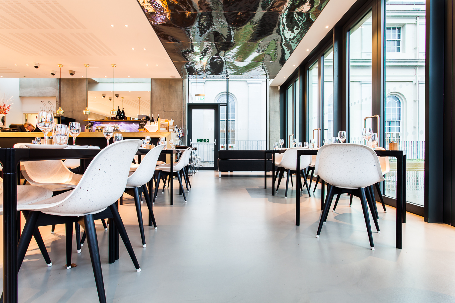 Grey commercial resin flooring in a restaurant