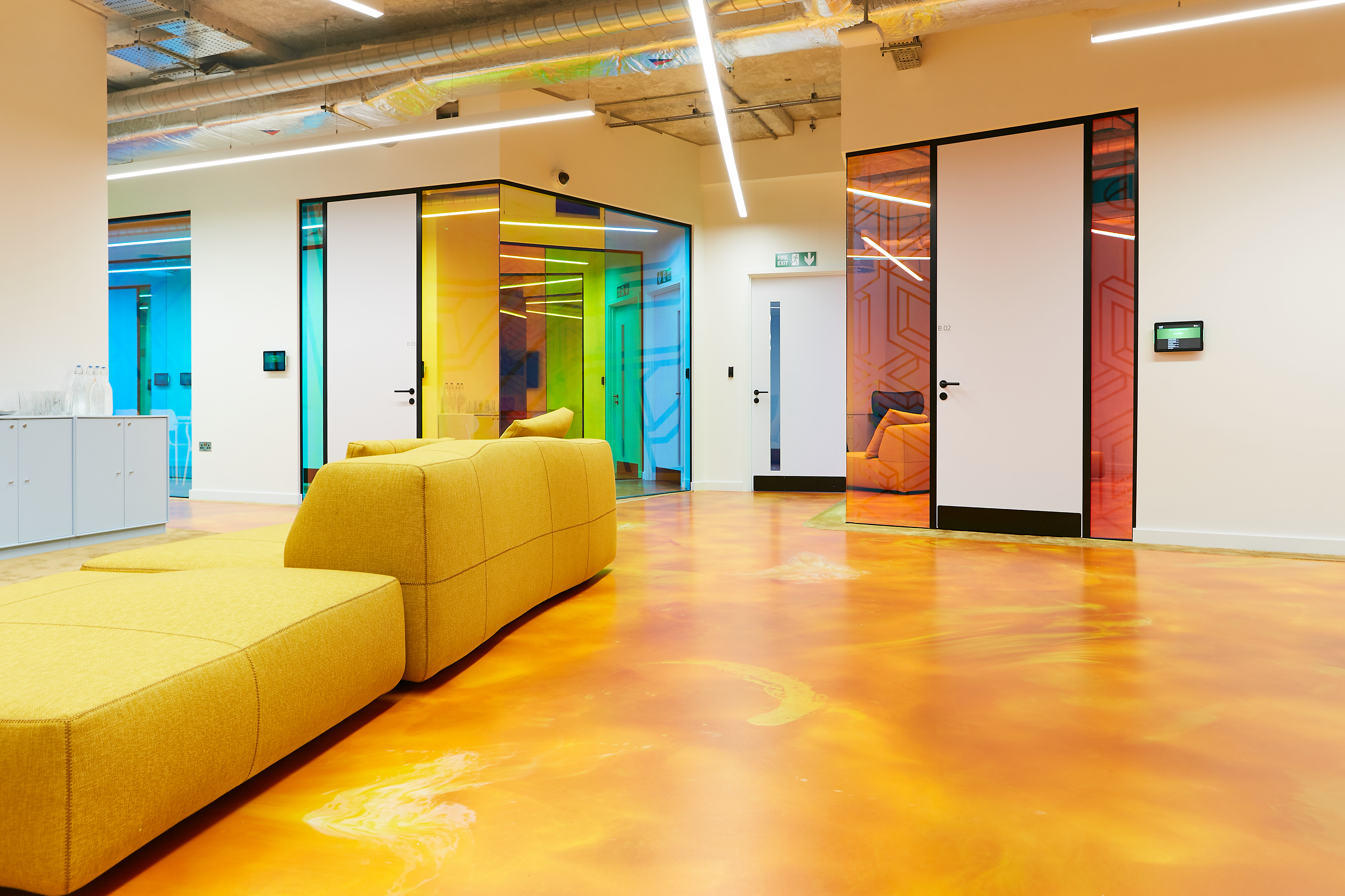 An orange resin floor in an office