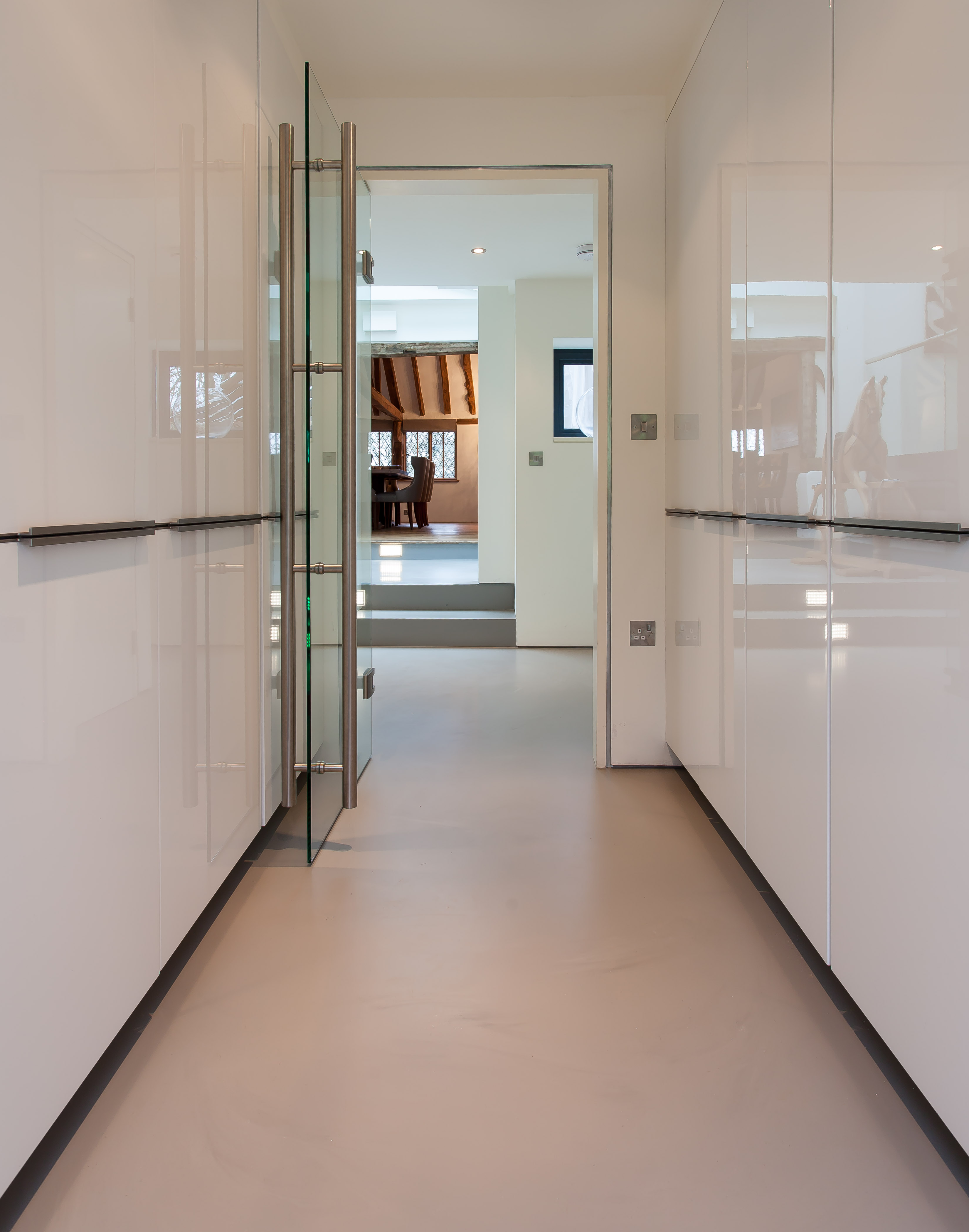 warm toned resin floors in a kitchen