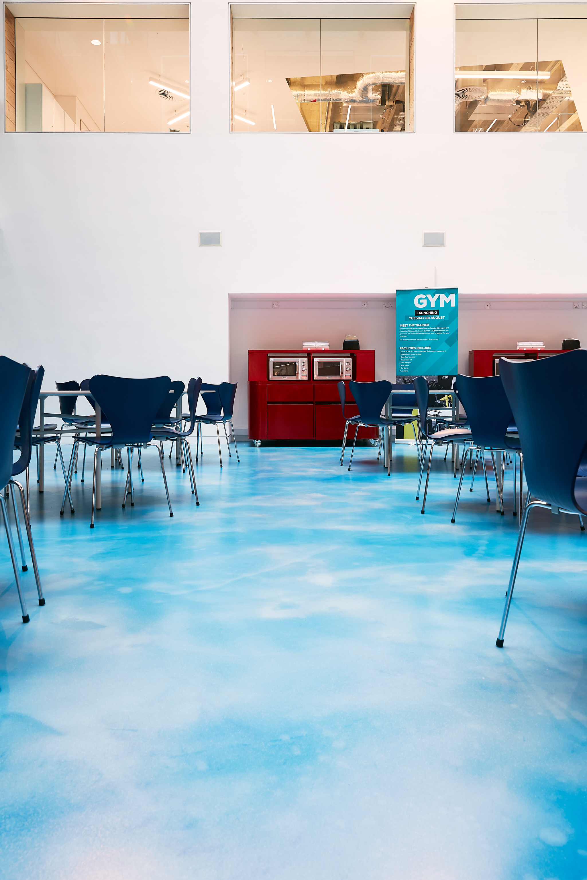 Commercial resin floor in a blue sky design in a cafe