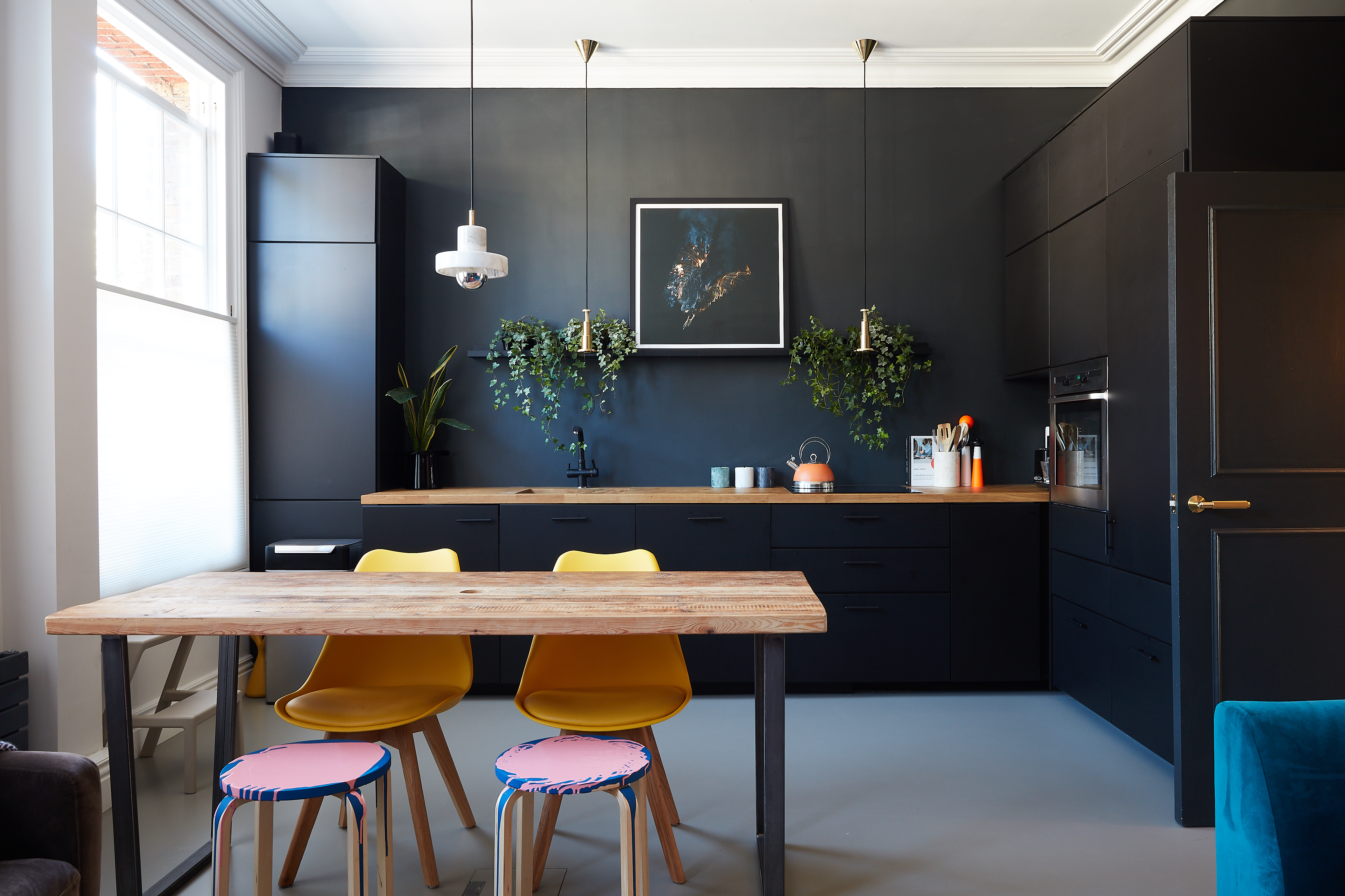 a grey resin floor in a kitchen