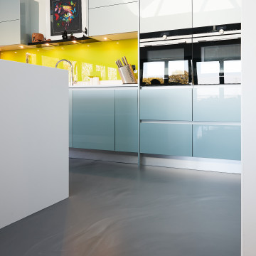 resin flooring underfloor heating in a residential kitchen