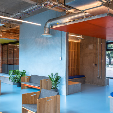 A blue resin floor in a student accommodation