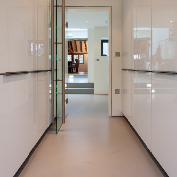 warm toned resin floors in a kitchen