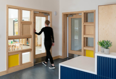 Blue resin nursery flooring in a hallway