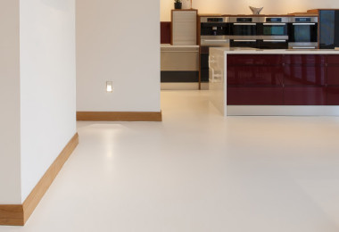 Open plan kitchen with resin flooring