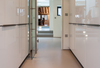 warm toned resin floors in a kitchen