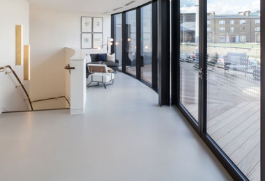 Light grey residential resin floors in hallway