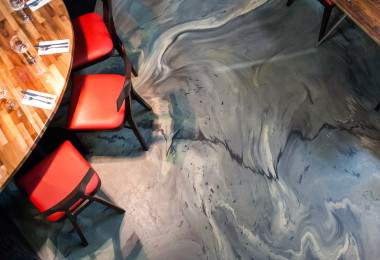 Grey commercial resin floor in a restaurant