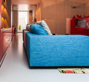 Light grey resin floor in a home living room