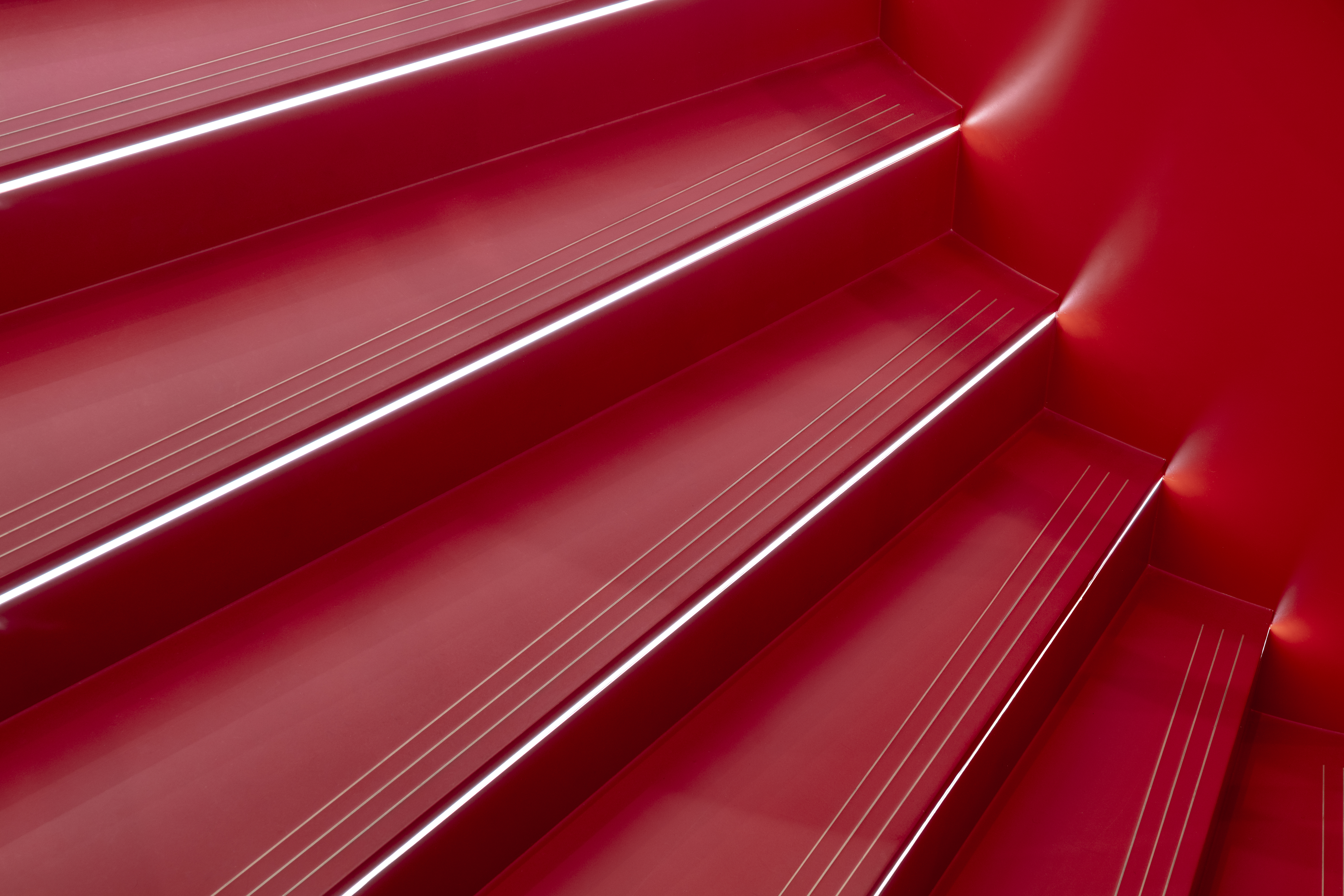 A red resin staircase 