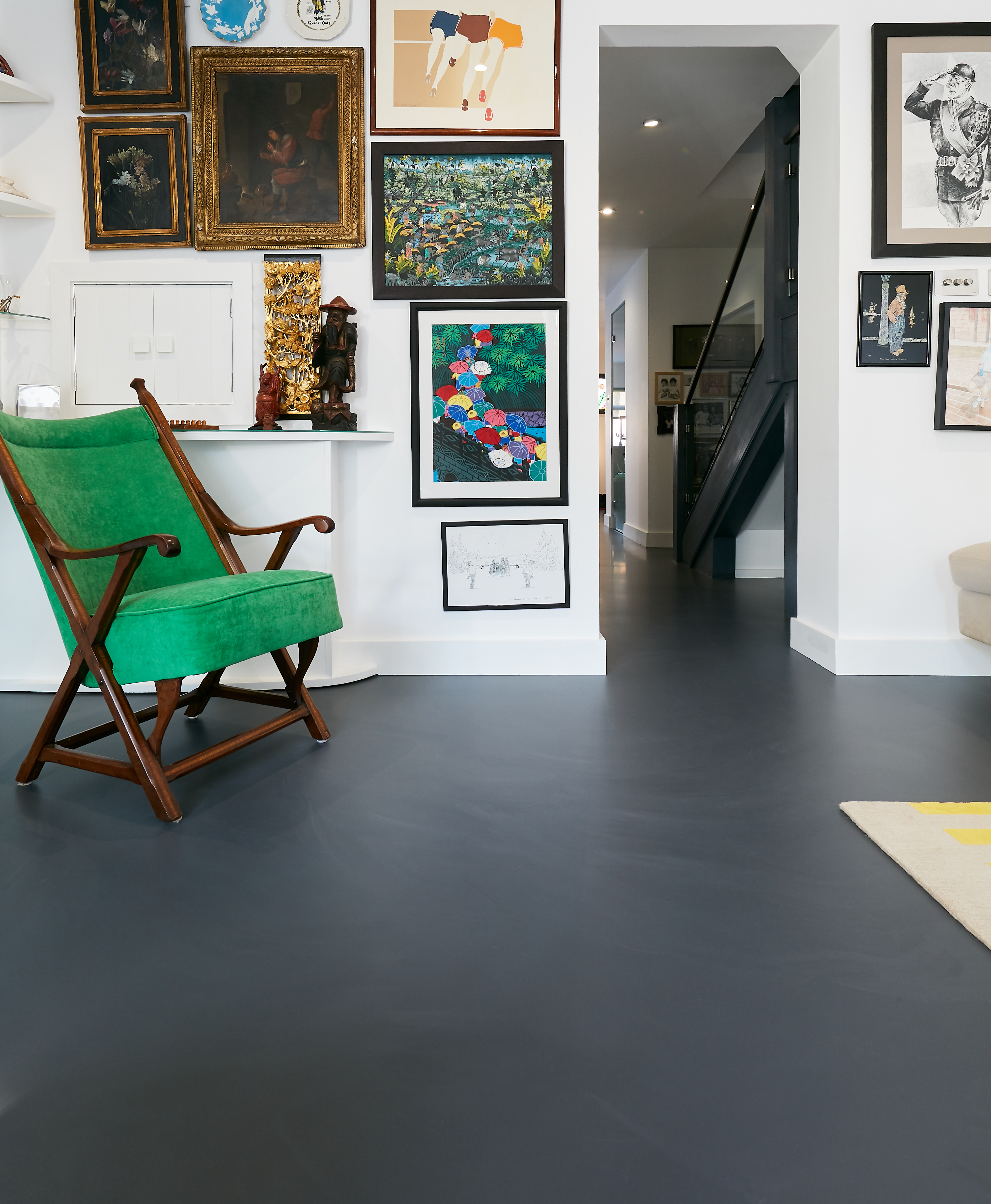 a dark grey resin floor in a living room