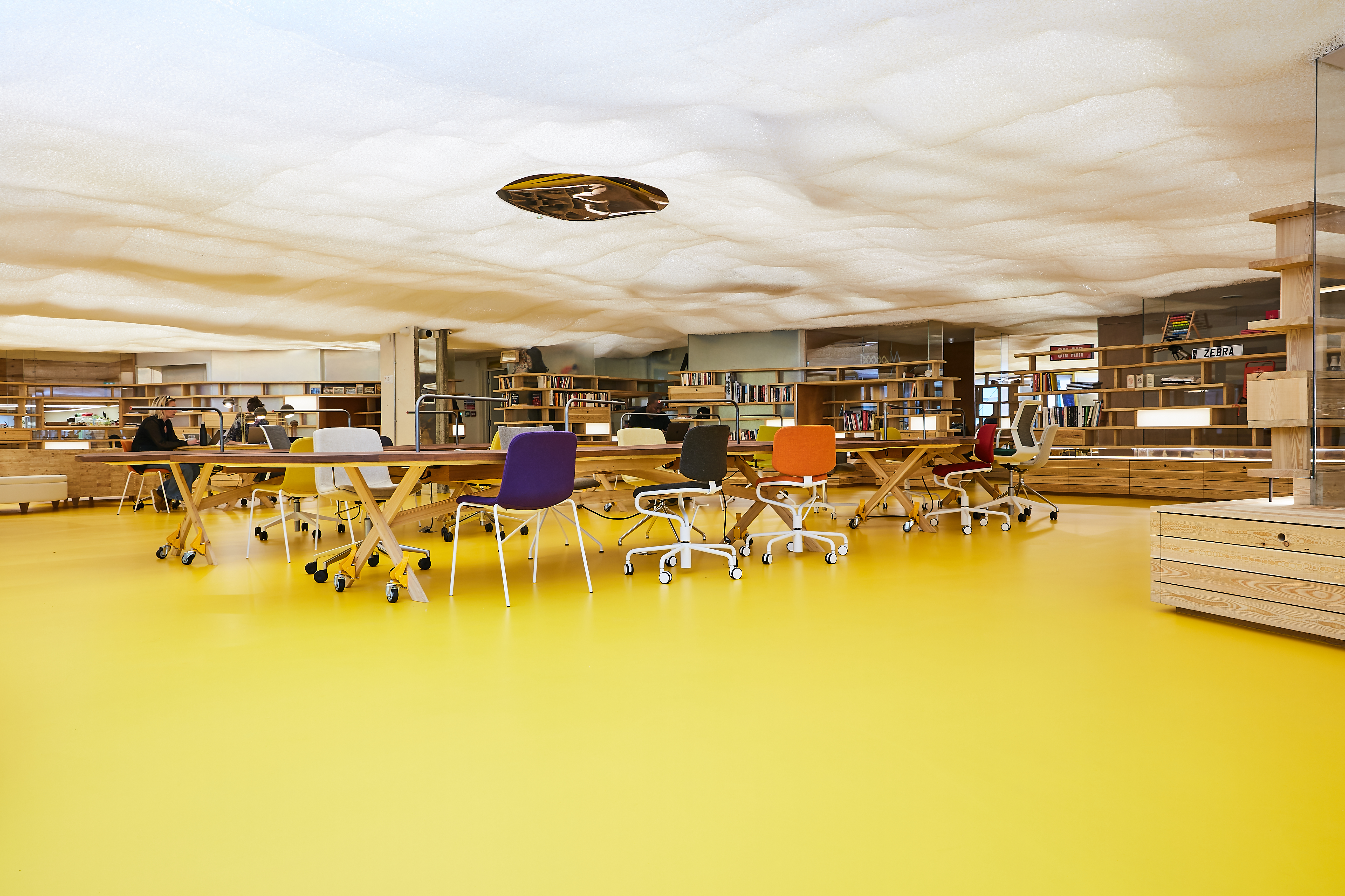 Bright yellow commercial resin flooring in an office