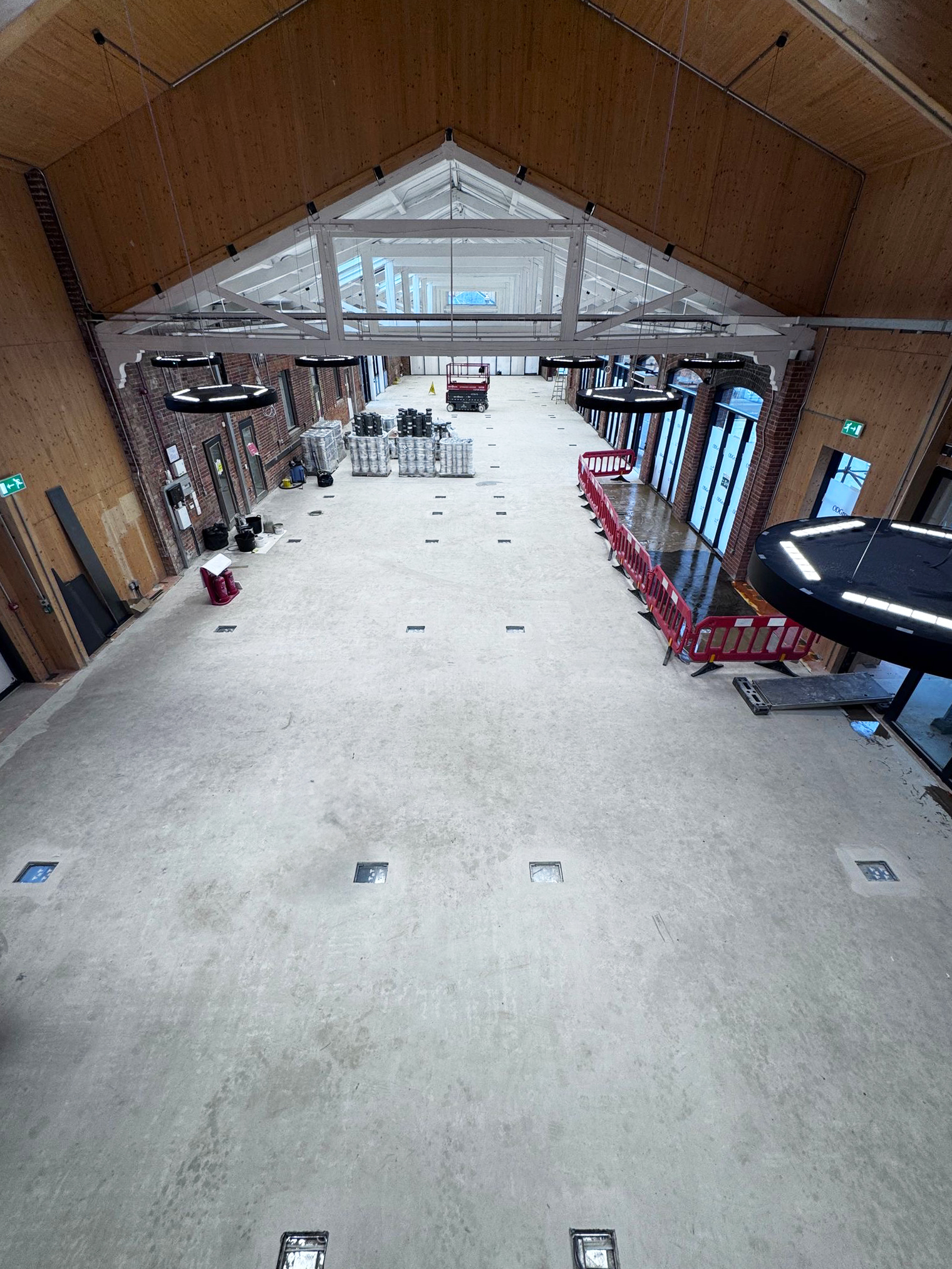Large open space with a concrete floor