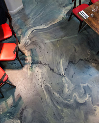 Grey commercial resin floor in a restaurant