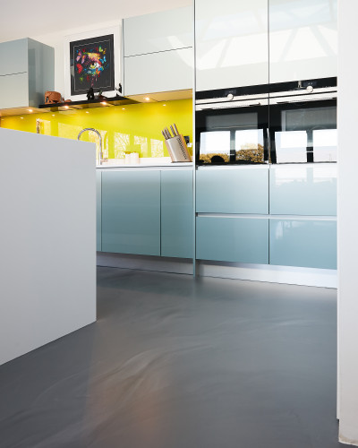 resin flooring underfloor heating in a residential kitchen