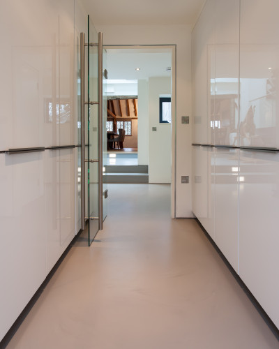 warm toned resin floors in a kitchen