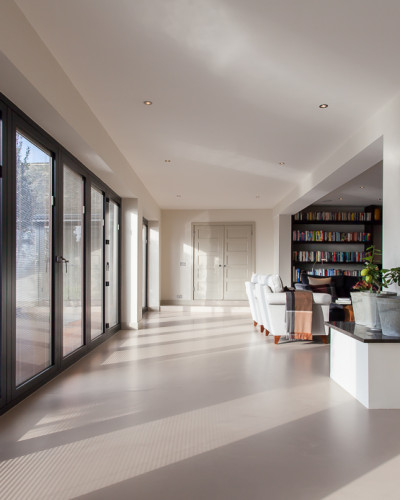 Grey sustainable resin flooring in a kitchen room